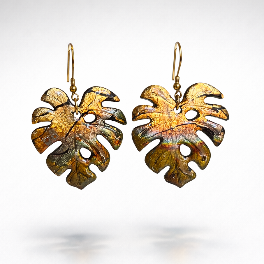 Monsteran koruosa MIGIAn kultaamaa 925 hopeaa.